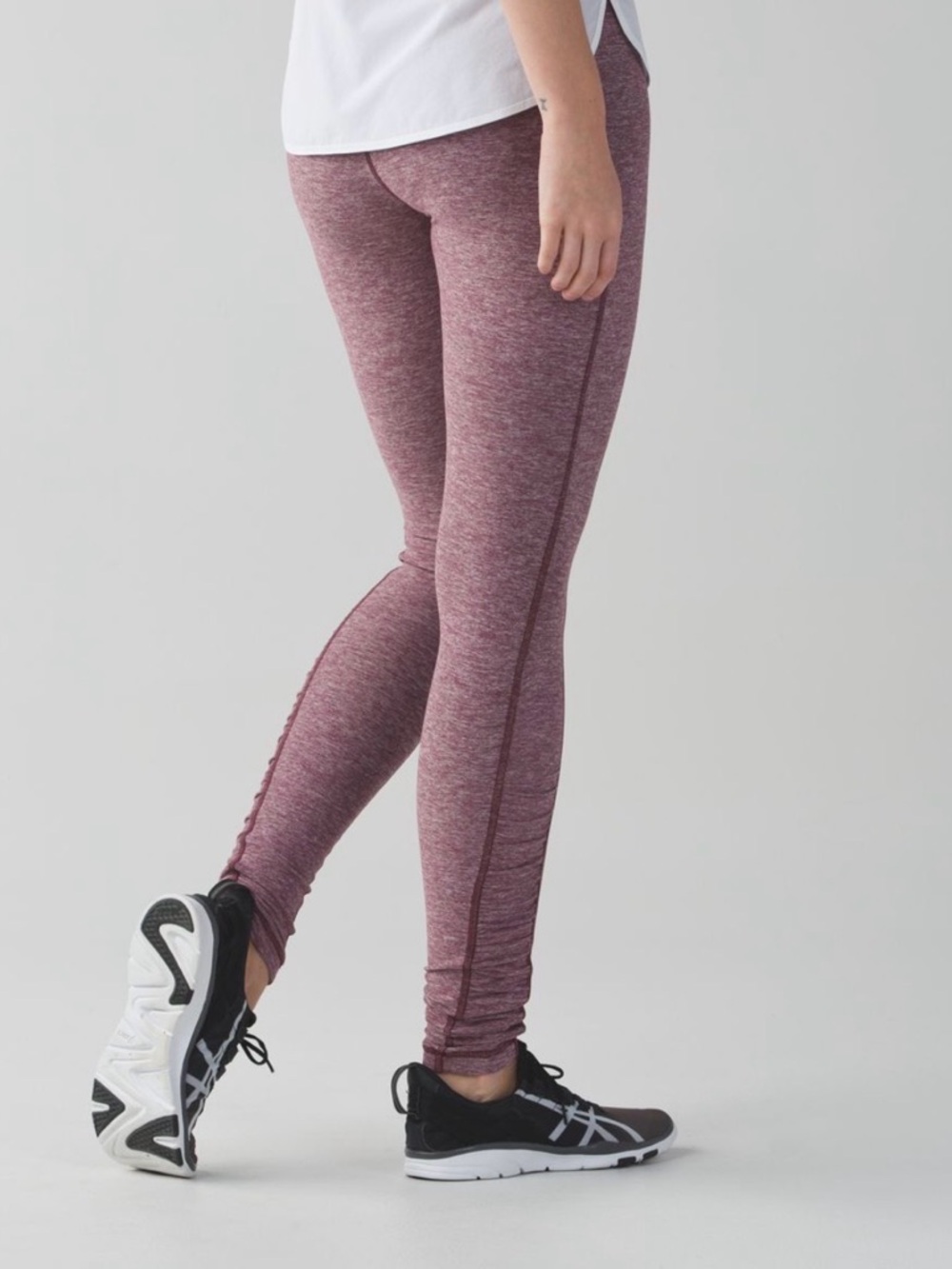 Lululemon Turn Around Tights in the color Heathered Bordeaux Drama